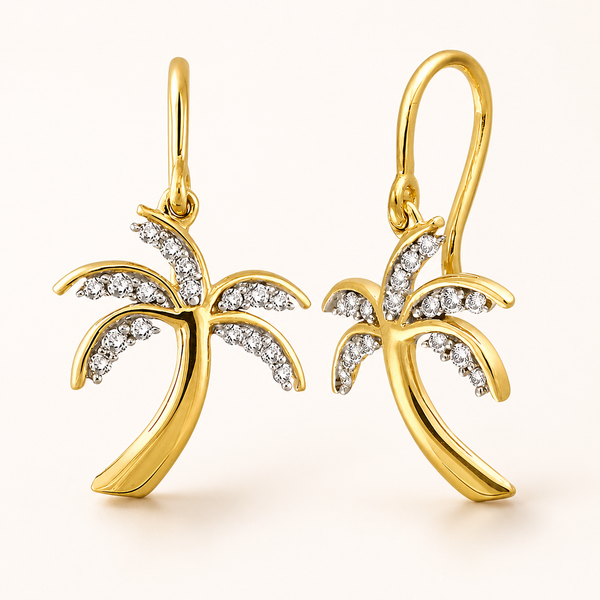 Gold palm tree earrings with diamond accents on a white background