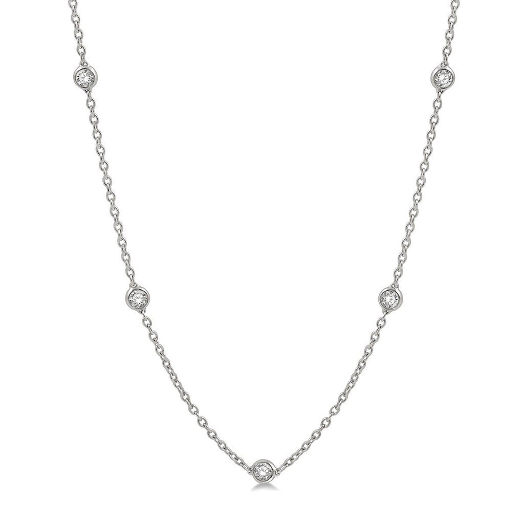 photo of necklace, eleven round brilliant diamonds — 1.00twt 14k white gold. 18" long. 
