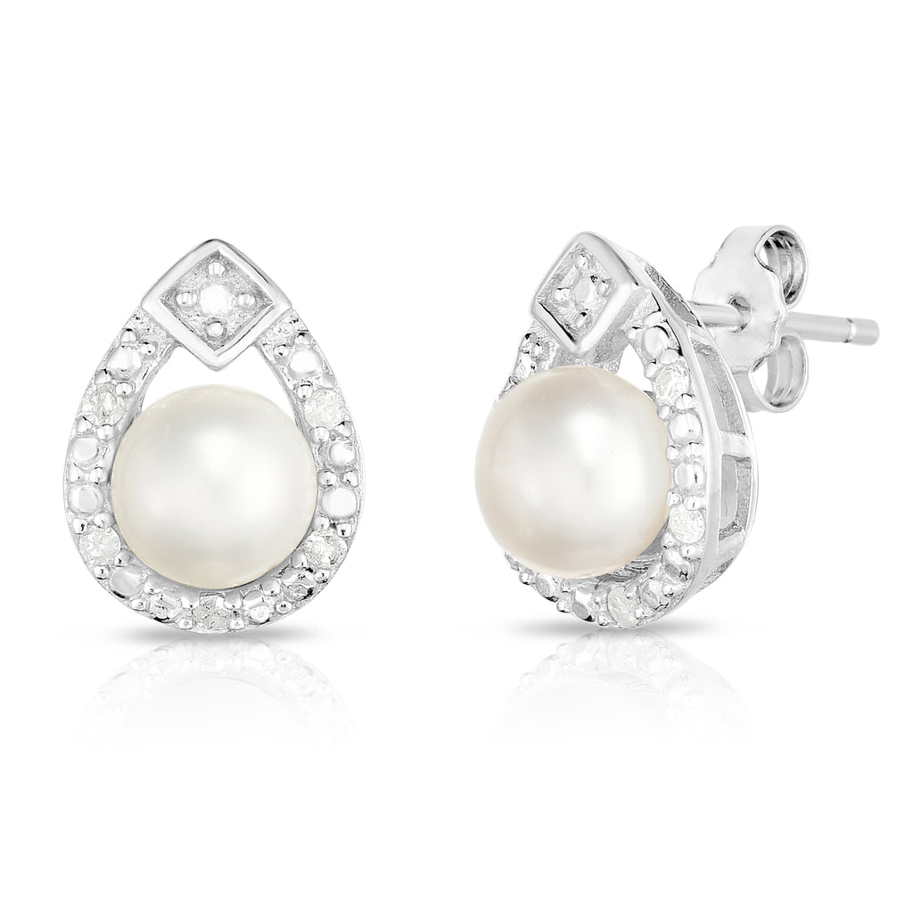 photo of pear-shaped pearl and diamond border earrings set in white gold
