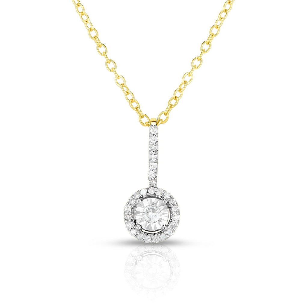 photo of classic solitaire diamond pendant with diamond cut details for added sparkle, .15twt round diamonds set in sterling silver with yellow gold overlay and worn on an 18" cable chain