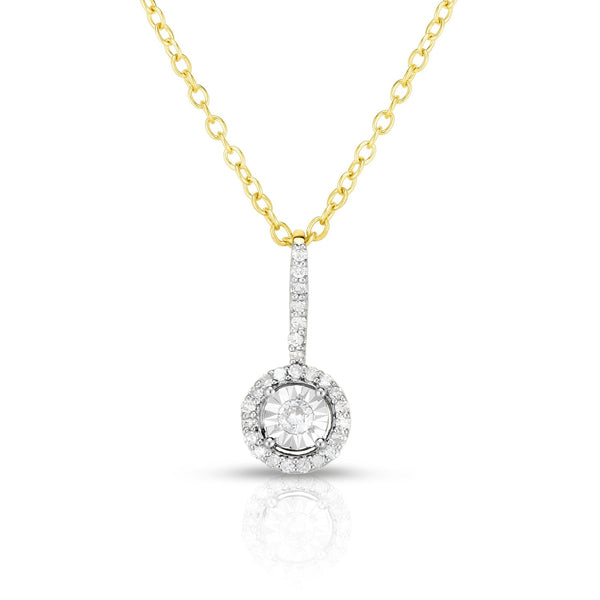 photo of classic solitaire diamond pendant with diamond cut details for added sparkle, .15twt round diamonds set in sterling silver with yellow gold overlay and worn on an 18" cable chain