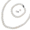 photo of white pearl set, includes earrings, 7" bracelet and an 18" strand